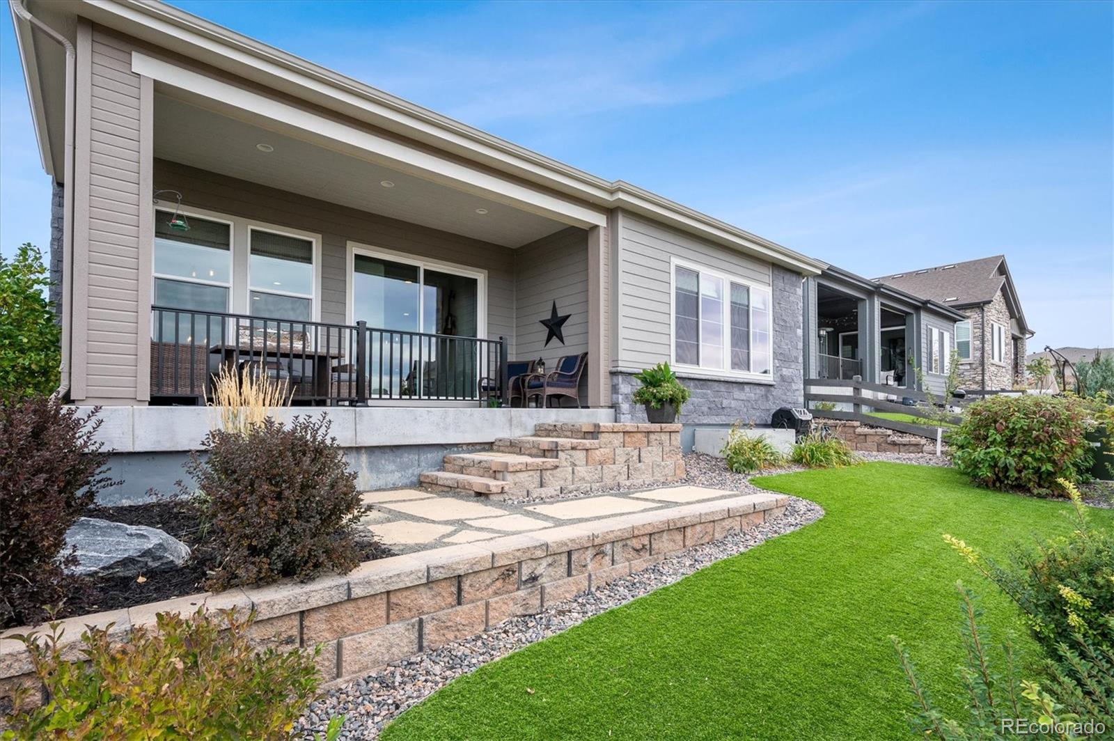 2095 Rim Ridge Drive Castle Pines, CO 80108 - Photo 41 of 46 a view of house with back yard