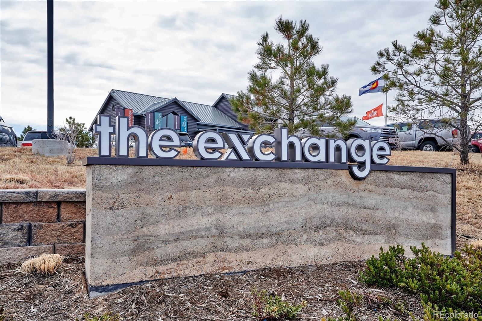 2095 Rim Ridge Drive Castle Pines, CO 80108 - Photo 43 of 46 a street sign that is on a brick wall