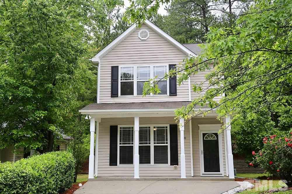 1009 Dual Parks Road Apex, NC 27502 - Photo 1 of 15 Rocking chair front porch and walking trails across the street will add to your enjoyment of this home!