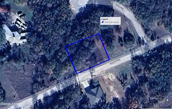 a sign that is on the side of the road