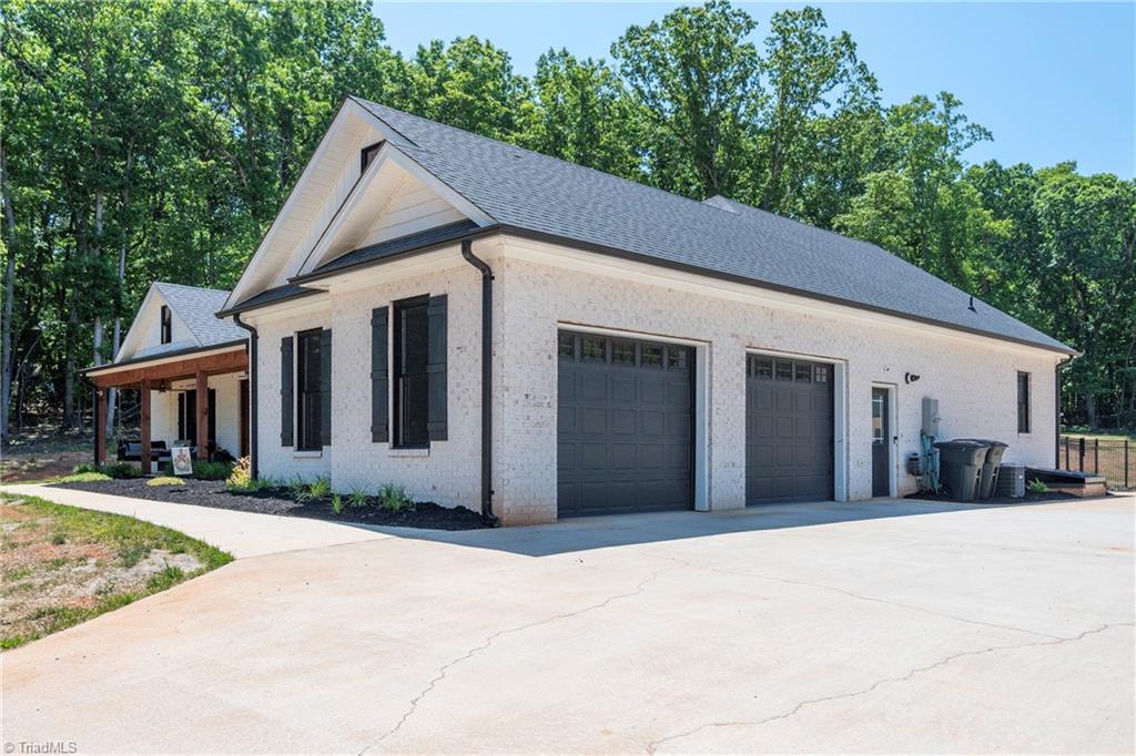 7988 Ridge Road Tobaccoville, NC 27050 - Photo 27 of 41 Side View or home