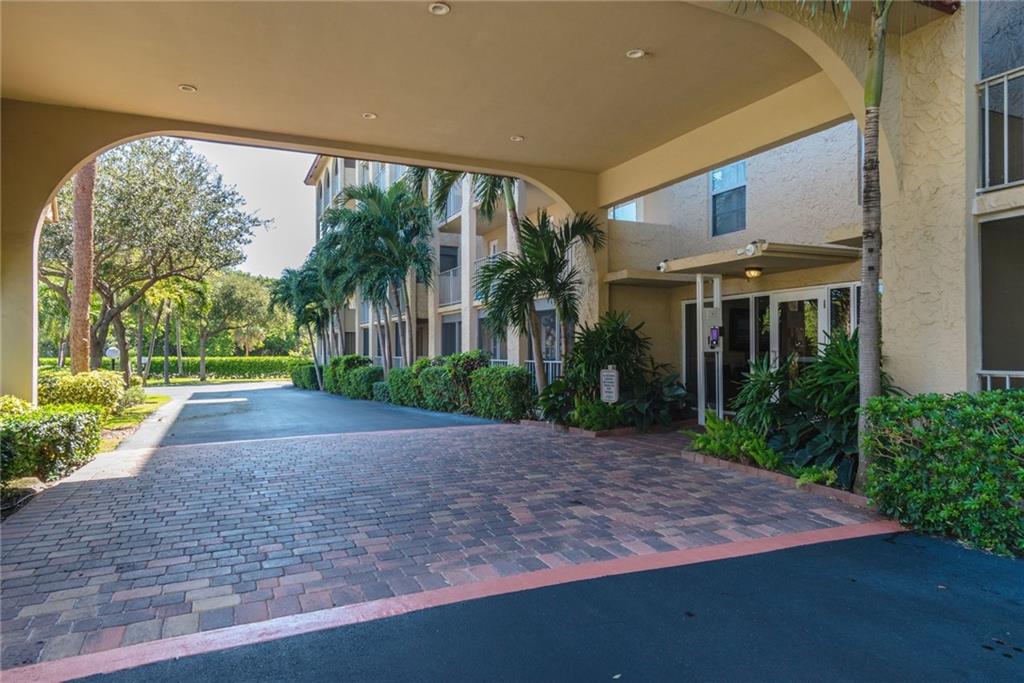 950 Ponce De Leon Road, Unit 408 Boca Raton, FL 33432 - Photo 28 of 51 a view of a yard with plants and trees