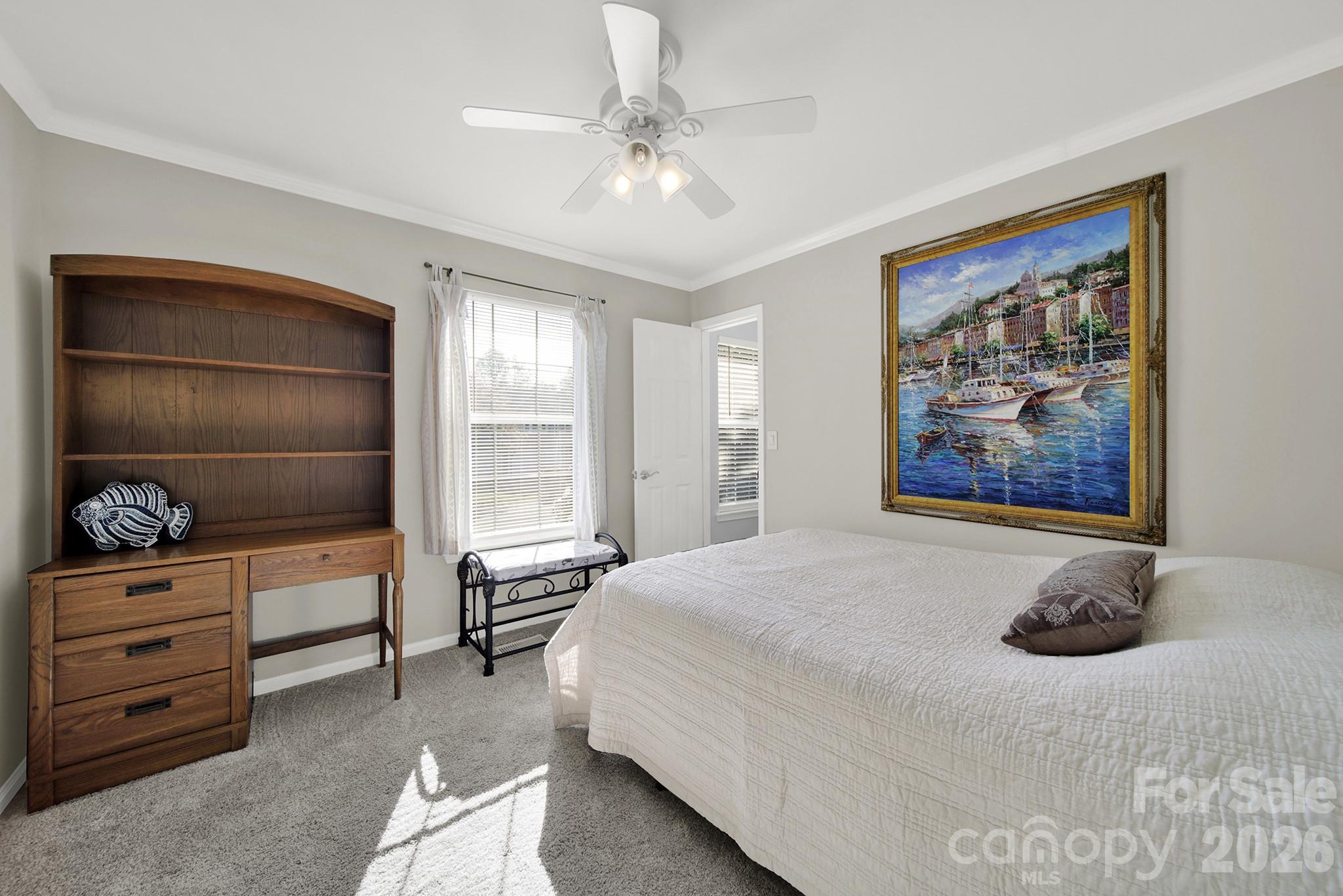 263 Fox Hollow Road Mooresville, NC 28117 - Photo 25 of 44 a bedroom with a bed and a dresser