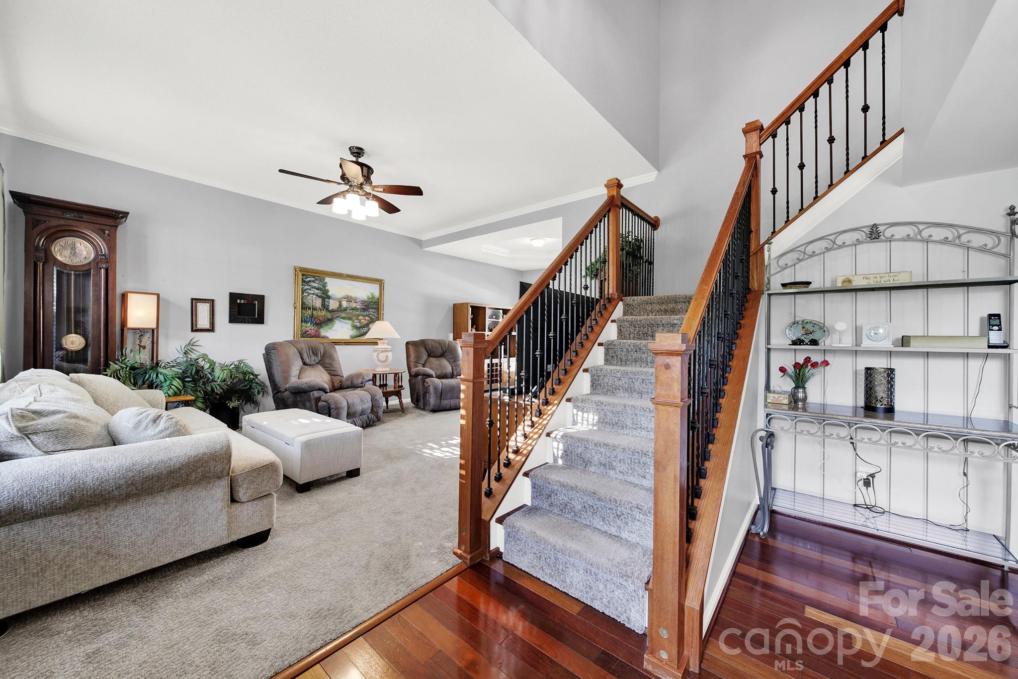 263 Fox Hollow Road Mooresville, NC 28117 - Photo 3 of 44 a living room with furniture and wooden floor