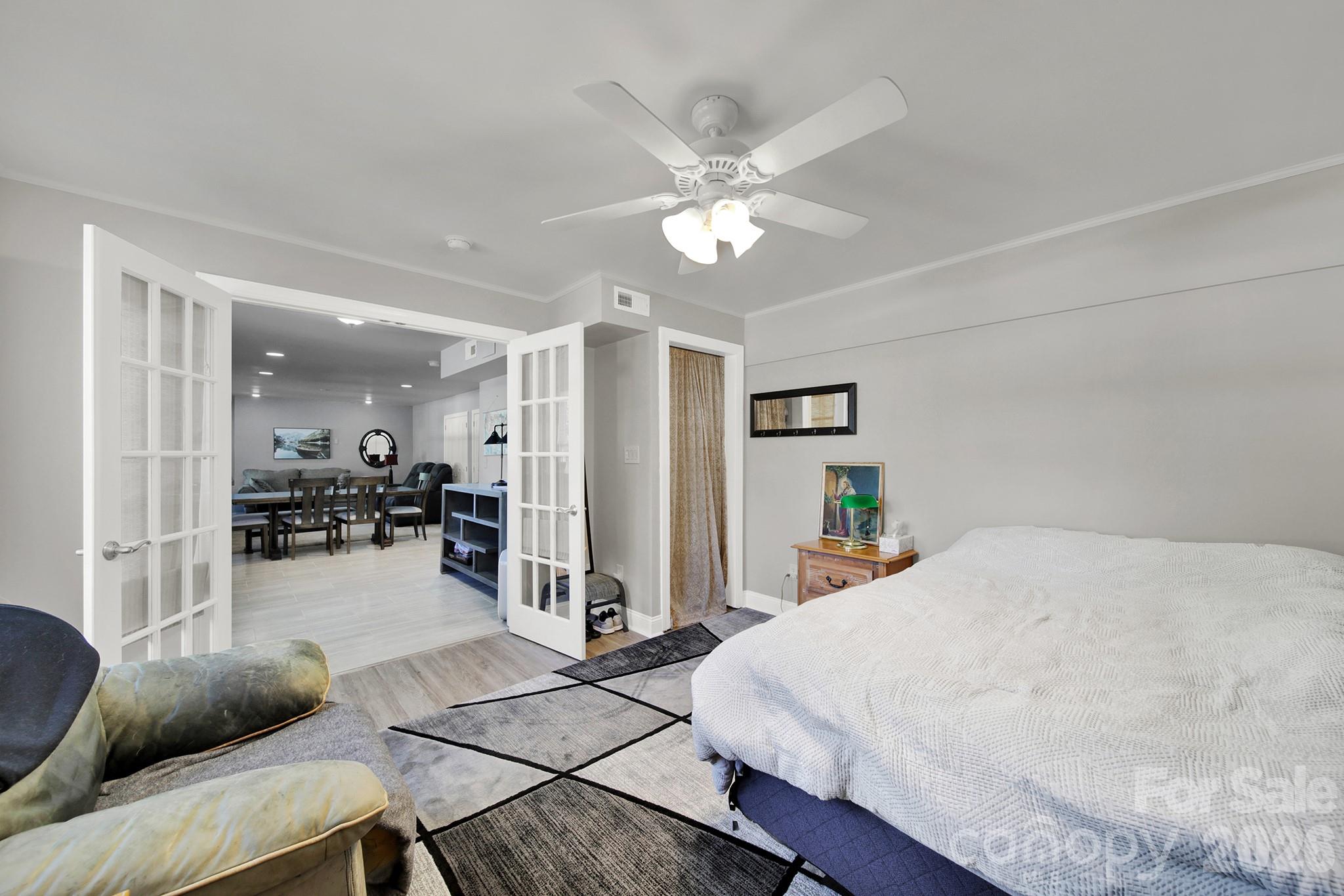 263 Fox Hollow Road Mooresville, NC 28117 - Photo 36 of 44 a living room with furniture and kitchen view
