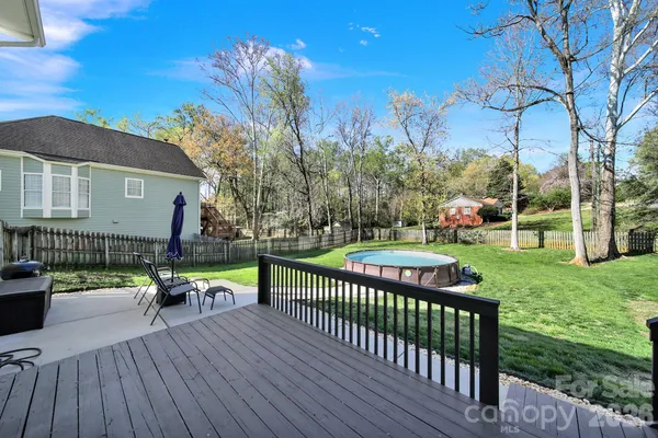 a big yard with table and chairs