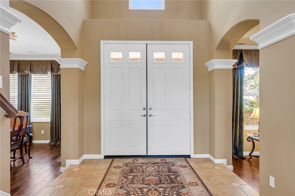 14143 Ashton Lane Riverside, CA 92508 - Photo 2 of 40 a view of a hallway with furniture and a window