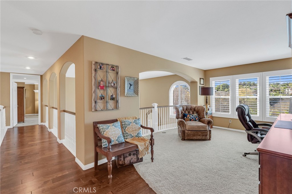 14143 Ashton Lane Riverside, CA 92508 - Photo 26 of 40 a living room with furniture and a large window