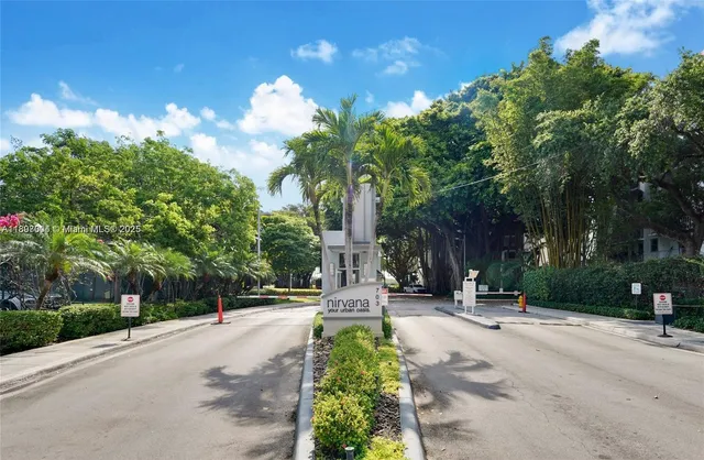 a pathway of a house with a yard