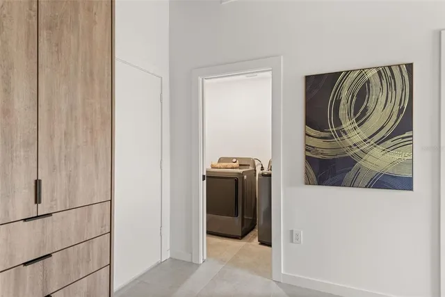 a bed room with a bed and a window