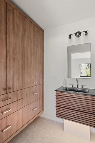 a bedroom with a bed and a shower