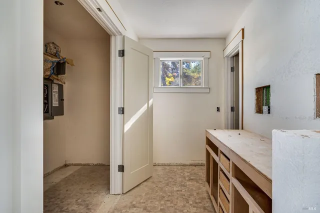 a kitchen with a stove and a microwave