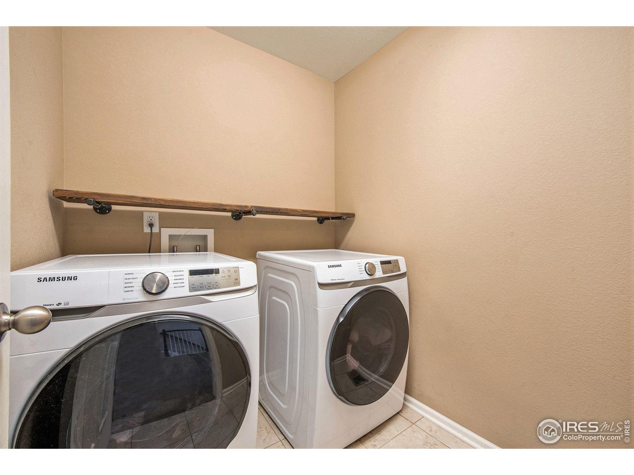 4872 Monarch Drive Firestone, CO 80504 - Photo 15 of 34 Upper-Level Laundry