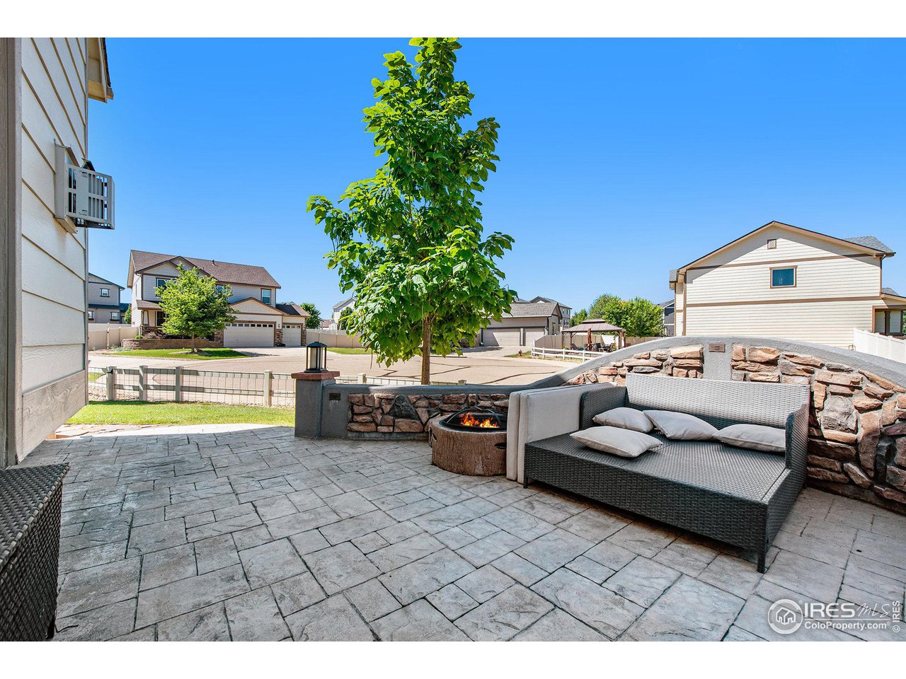 4872 Monarch Drive Firestone, CO 80504 - Photo 27 of 34 Stamped Concrete Patio - West Side of the Home