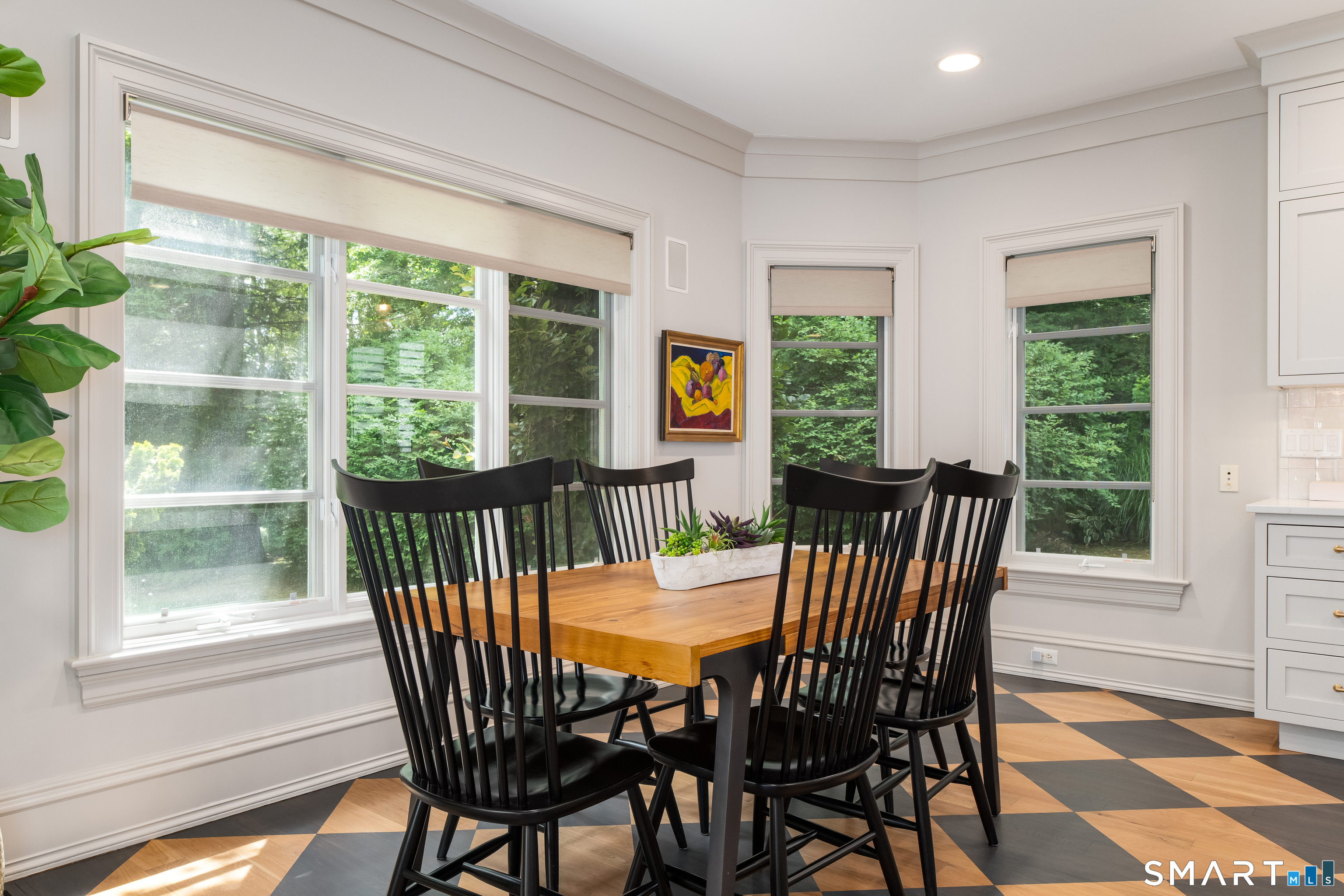 760 Smith Ridge Road New Canaan, CT 06840 - Photo 9 of 40 a view of a dining room with furniture window and outside view