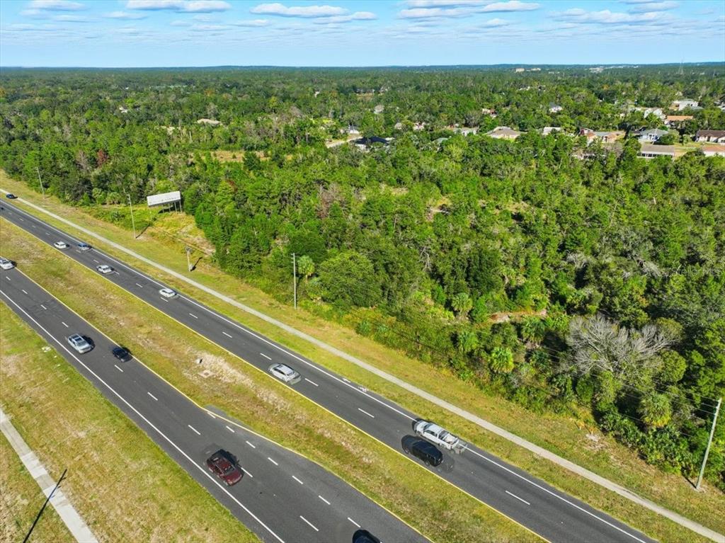 7124 Commercial Way Weeki Wachee, FL 34613 - Photo 11 of 30 a view of a garden