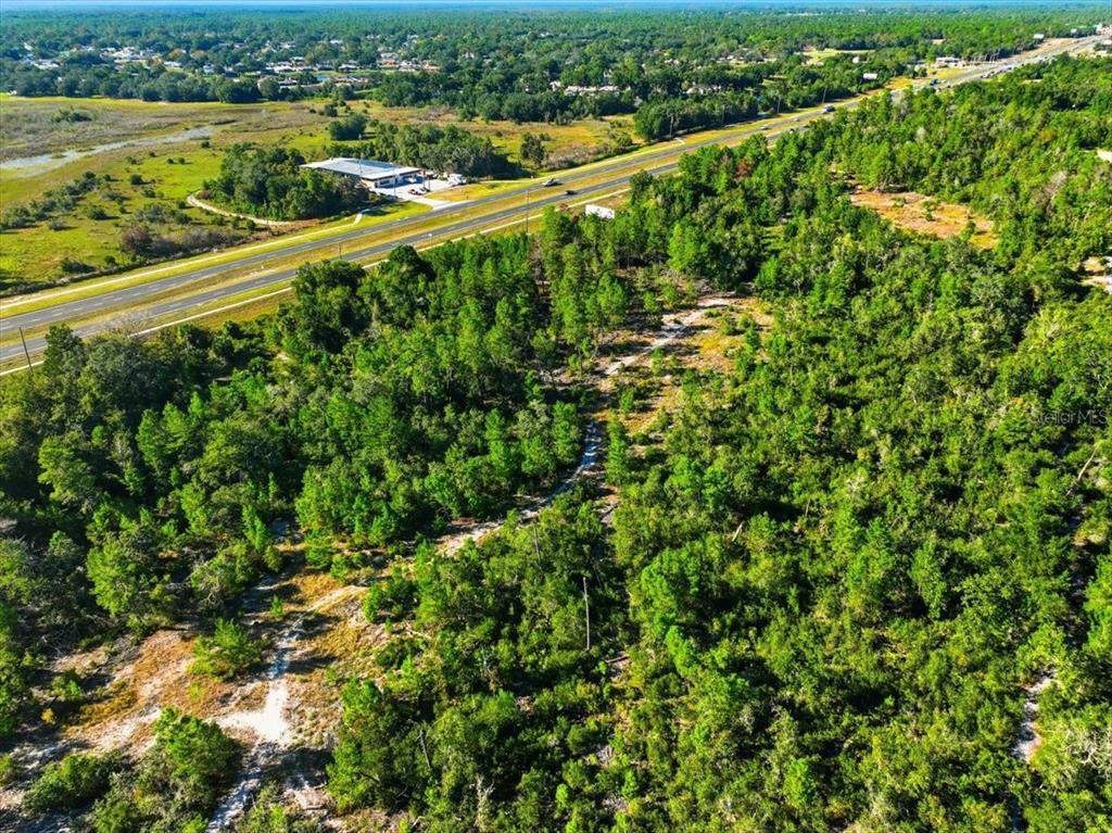 7124 Commercial Way Weeki Wachee, FL 34613 - Photo 27 of 30 a view of a city