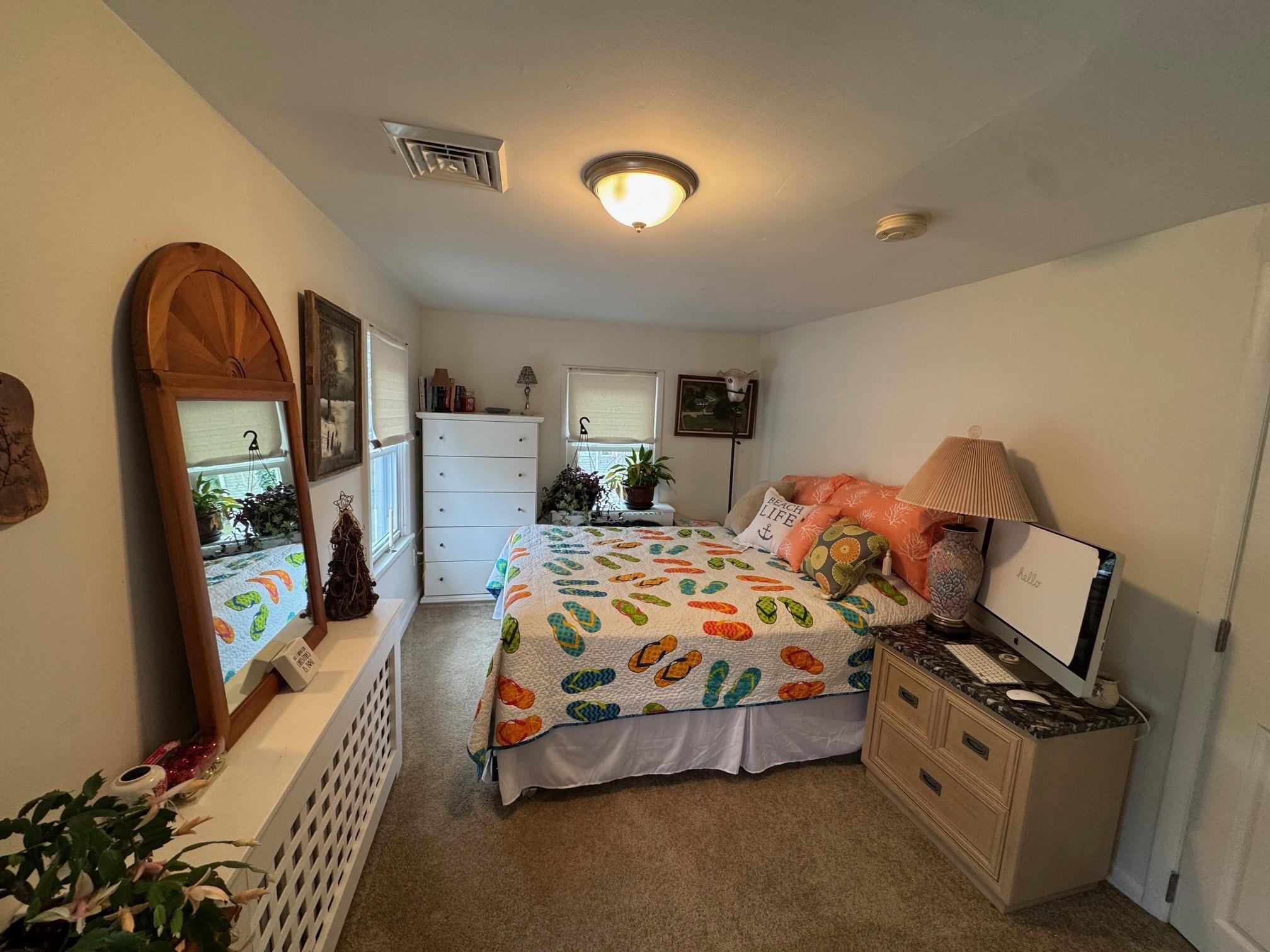 1801 Tilton Road Northfield, NJ 08225 - Photo 22 of 30 a bedroom with bed and a window