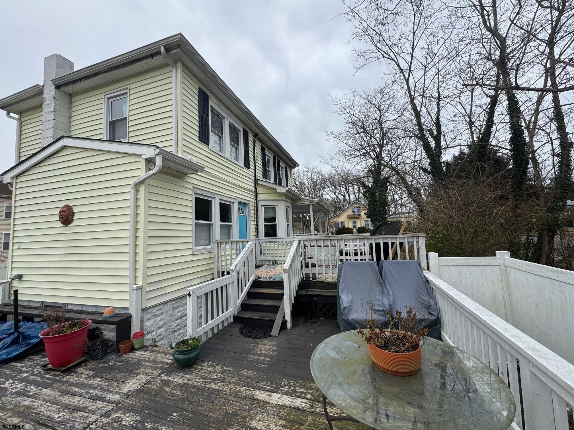 1801 Tilton Road Northfield, NJ 08225 - Photo 24 of 30 a view of a patio with couches and a barbeque