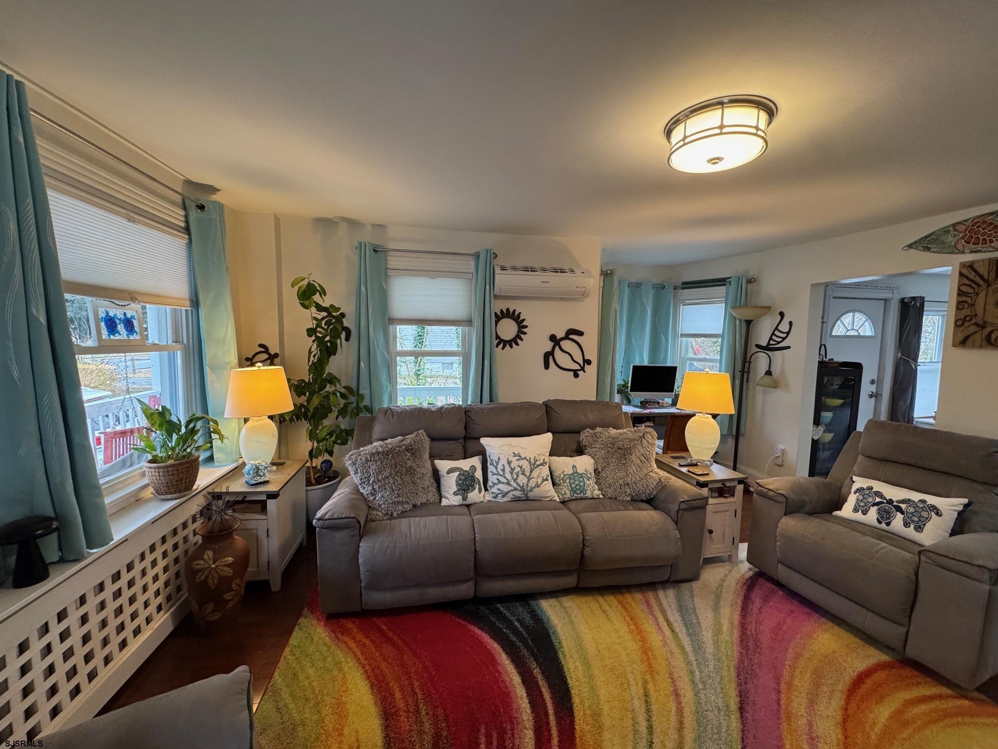 1801 Tilton Road Northfield, NJ 08225 - Photo 9 of 30 a living room with furniture and wooden floor