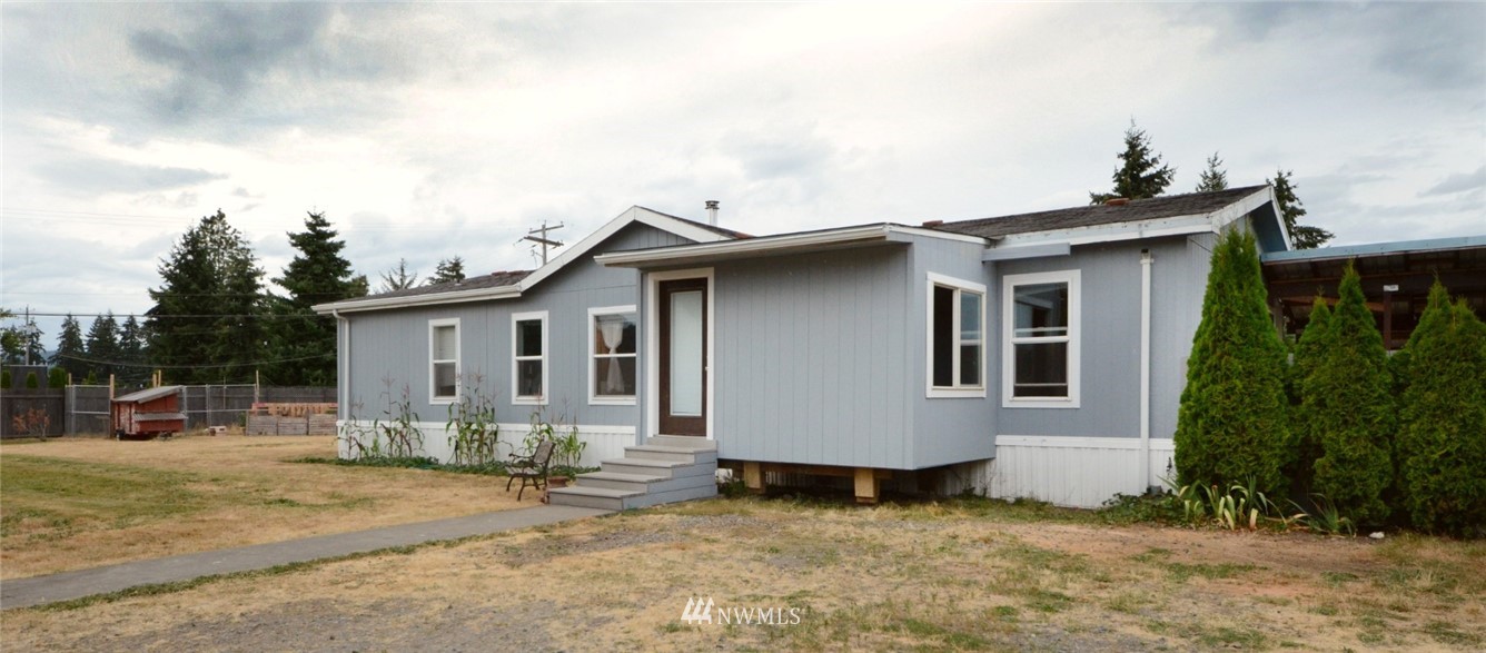 18224 Pendleton Street Southwest Rochester, WA 98579 - Photo 2 of 35 a view of a house with backyard