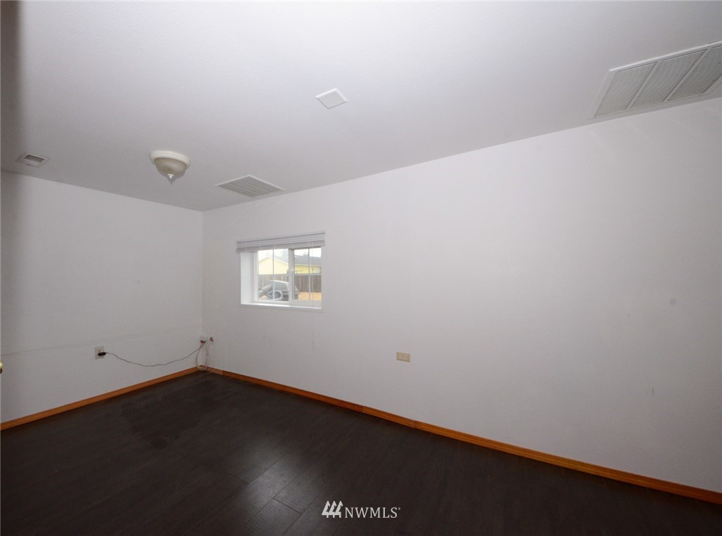 18224 Pendleton Street Southwest Rochester, WA 98579 - Photo 23 of 35 an empty room with a window