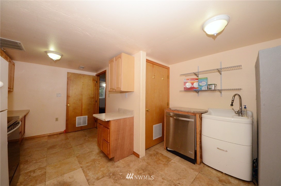 18224 Pendleton Street Southwest Rochester, WA 98579 - Photo 25 of 35 a view of a storage & utility room with a sink
