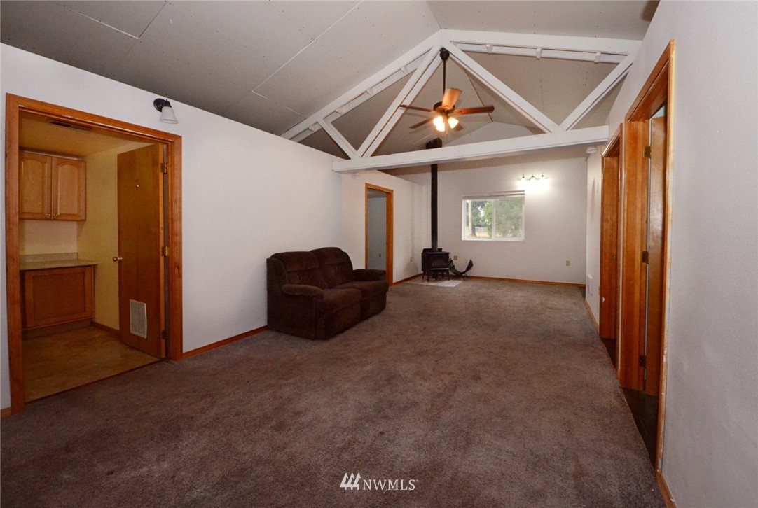 18224 Pendleton Street Southwest Rochester, WA 98579 - Photo 27 of 35 a view of a livingroom with furniture and a window