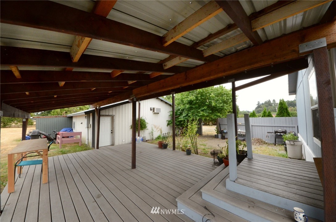 18224 Pendleton Street Southwest Rochester, WA 98579 - Photo 33 of 35 a view of a porch with wooden floor