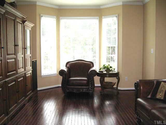 1603 Patterson Grove Road Apex, NC 27502 - Photo 3 of 12 Beautiful living room with bay window & refinished hardwoods Living Room