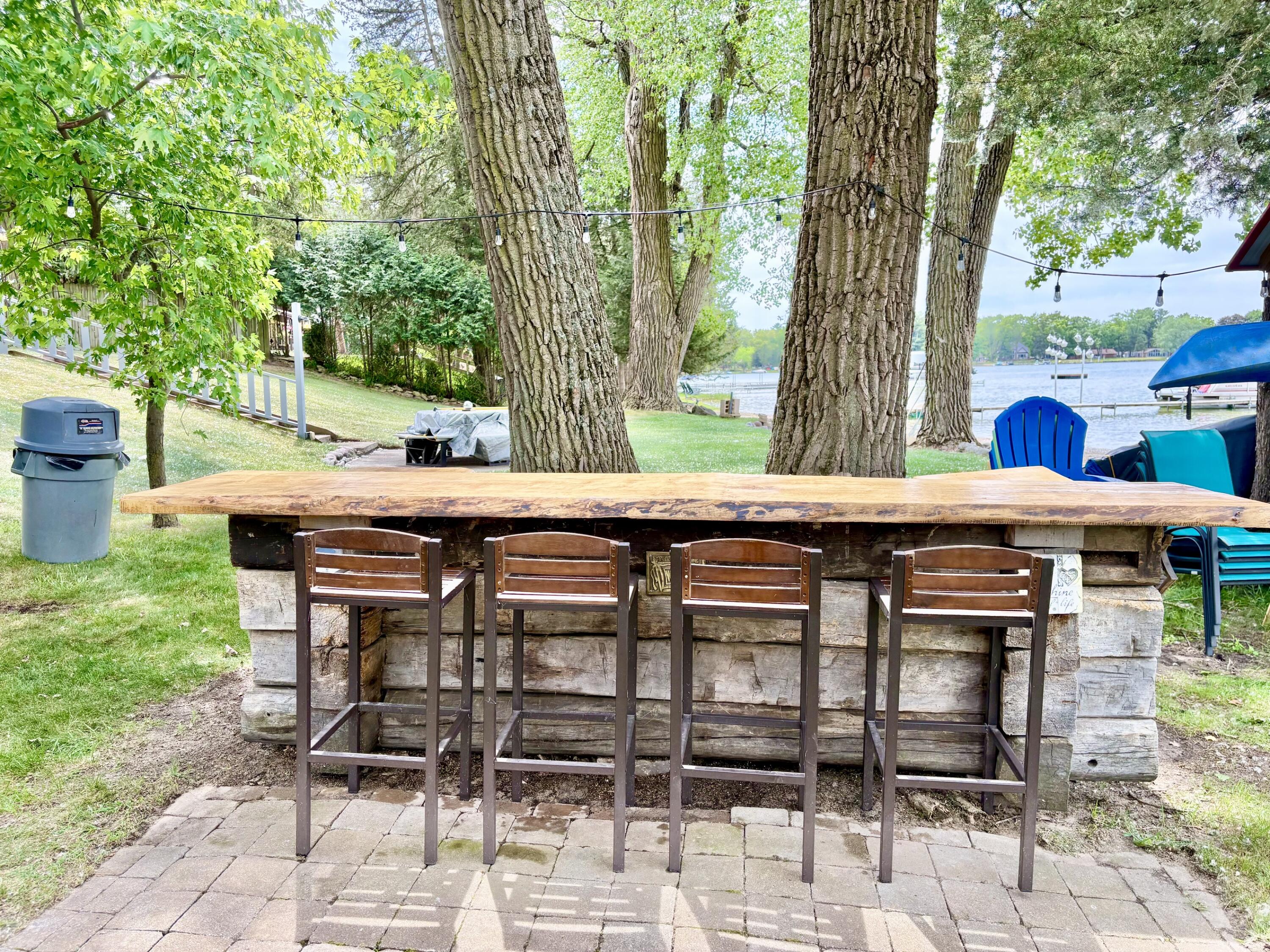 W376S4887 East Pretty Lake Road Ottawa, WI 53118 - Photo 6 of 61 Bar, String Lights and Barstools Included
