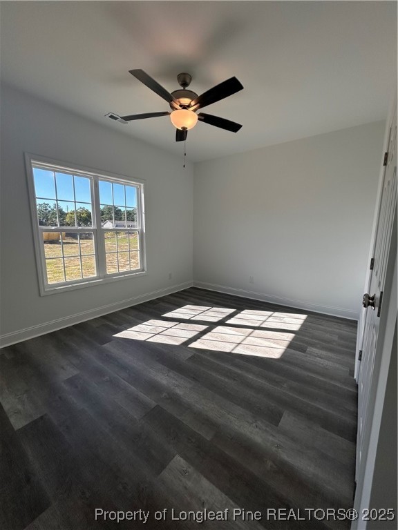 407 Morehead Street Spring Lake, NC 28390 - Photo 11 of 12 a view of empty room with wooden floor and fan