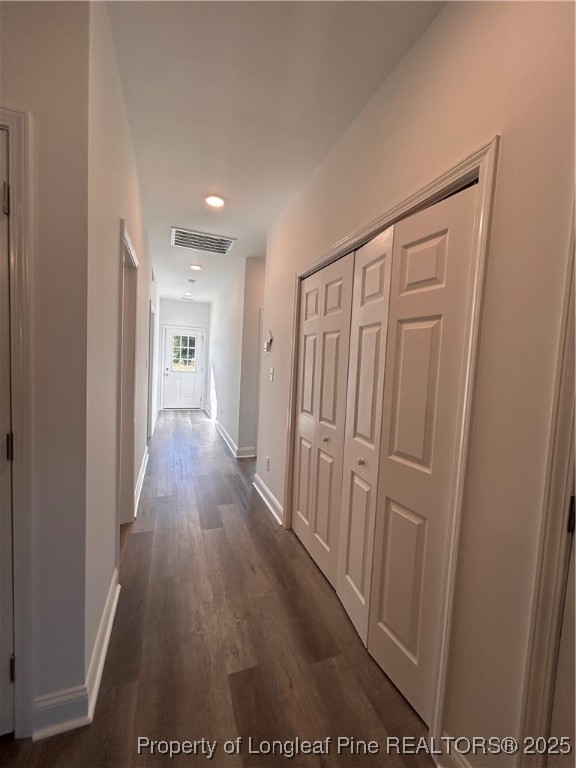 407 Morehead Street Spring Lake, NC 28390 - Photo 6 of 12 a view of a hallway with wooden floor