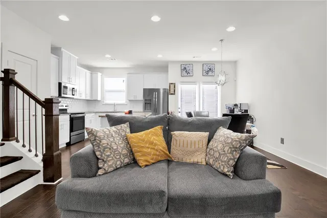 a living room with furniture and a couch