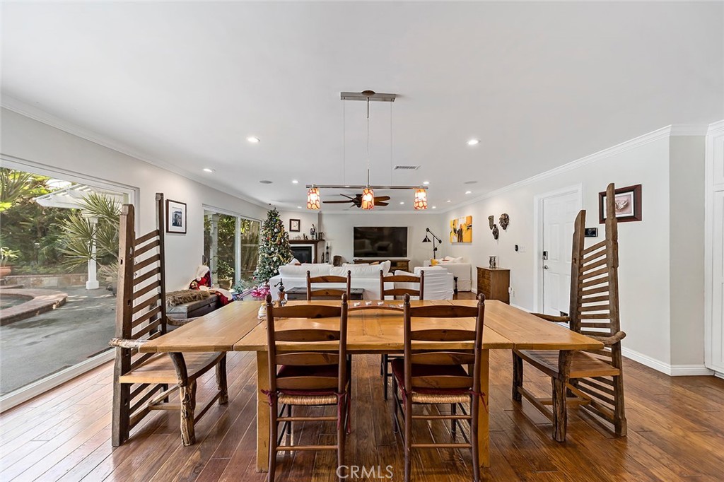 11792 Silver Fox Road Rossmoor, CA 90720 - Photo 12 of 49 a view of a dining room with furniture window and wooden floor