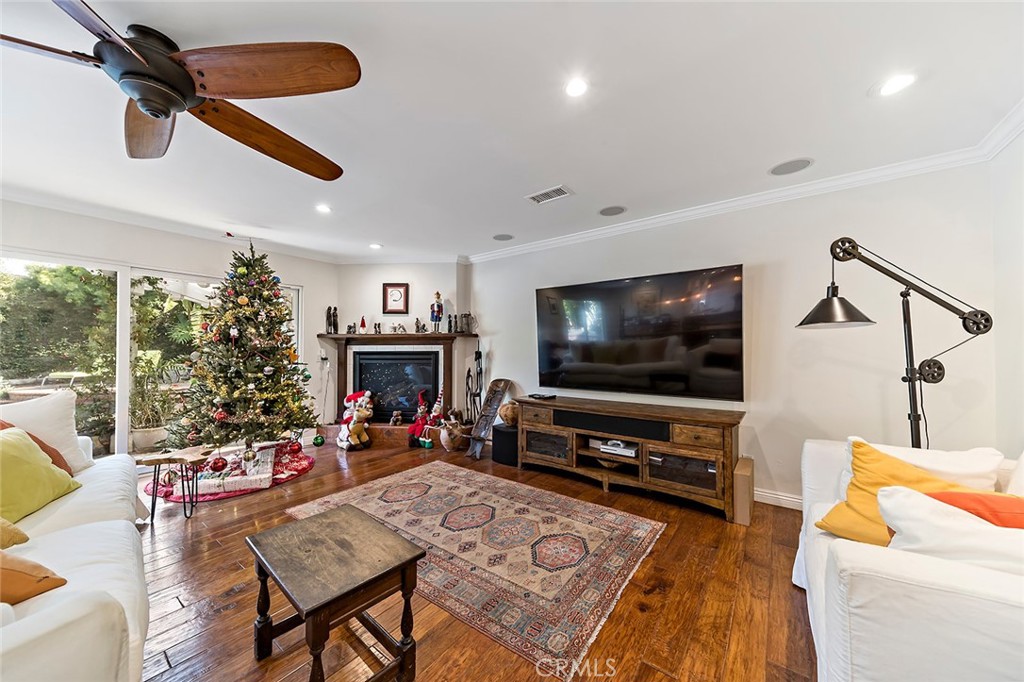 11792 Silver Fox Road Rossmoor, CA 90720 - Photo 13 of 49 a living room with furniture and a flat screen tv