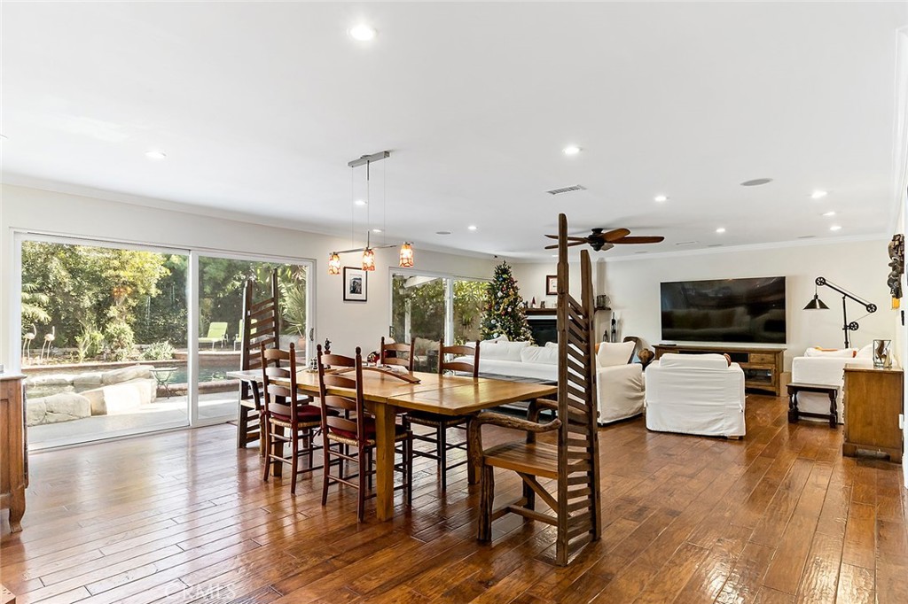 11792 Silver Fox Road Rossmoor, CA 90720 - Photo 14 of 49 a view of a dining room with furniture window and wooden floor