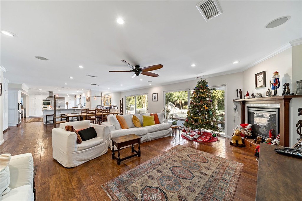 11792 Silver Fox Road Rossmoor, CA 90720 - Photo 16 of 49 a living room with furniture and a fireplace