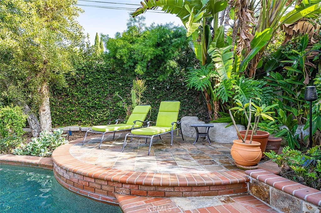 11792 Silver Fox Road Rossmoor, CA 90720 - Photo 23 of 49 a view of a backyard with sitting area