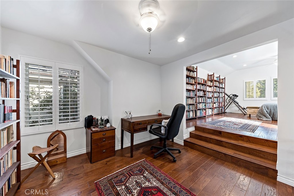 11792 Silver Fox Road Rossmoor, CA 90720 - Photo 27 of 49 a view of a workspace with furniture and a window