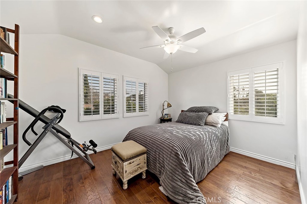 11792 Silver Fox Road Rossmoor, CA 90720 - Photo 29 of 49 a bedroom with a bed and a window