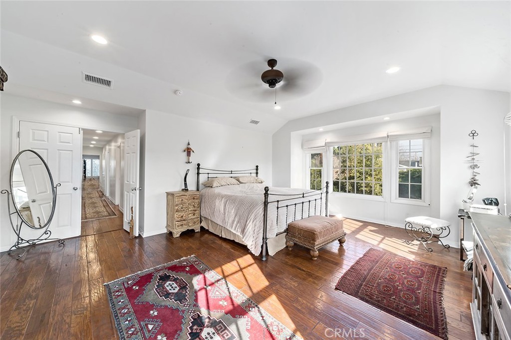 11792 Silver Fox Road Rossmoor, CA 90720 - Photo 32 of 49 a living room with furniture and a large window