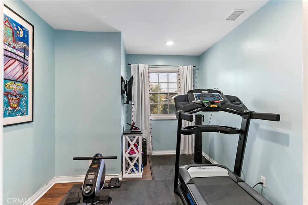 11792 Silver Fox Road Rossmoor, CA 90720 - Photo 39 of 49 a view of a room with gym equipment