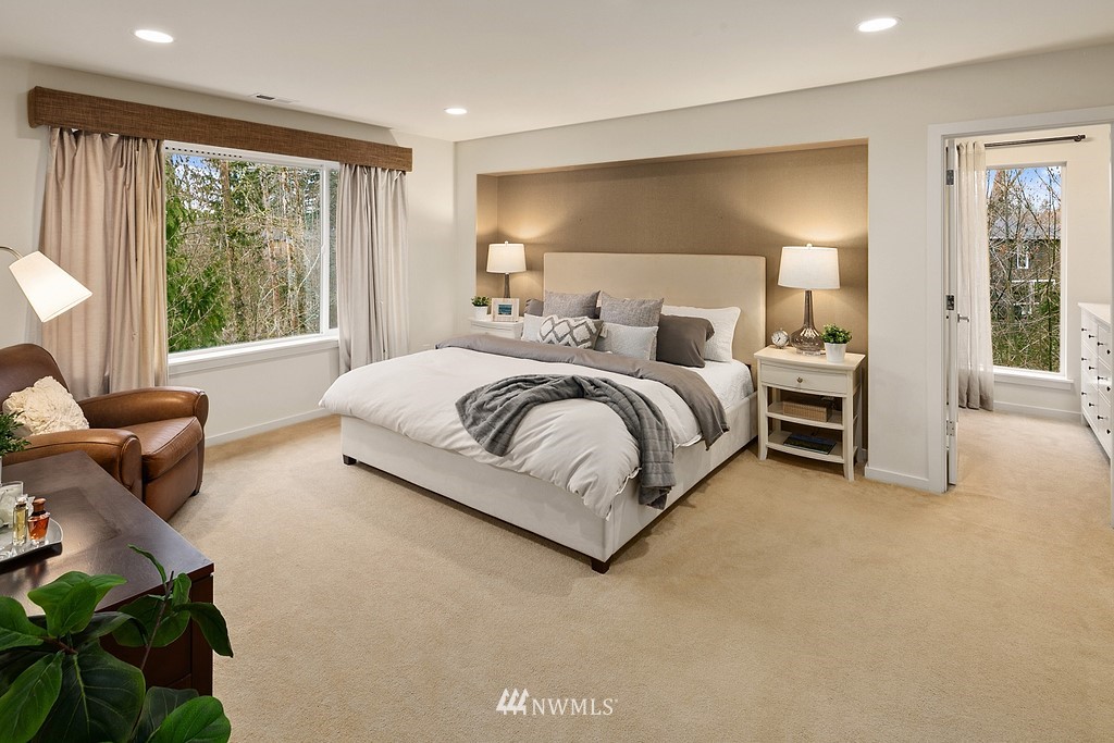 3901 171st Street Southeast Bothell, WA 98012 - Photo 25 of 40 a bed room with a bed and a couch