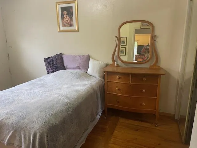 a front view of a house with a washer and dryer