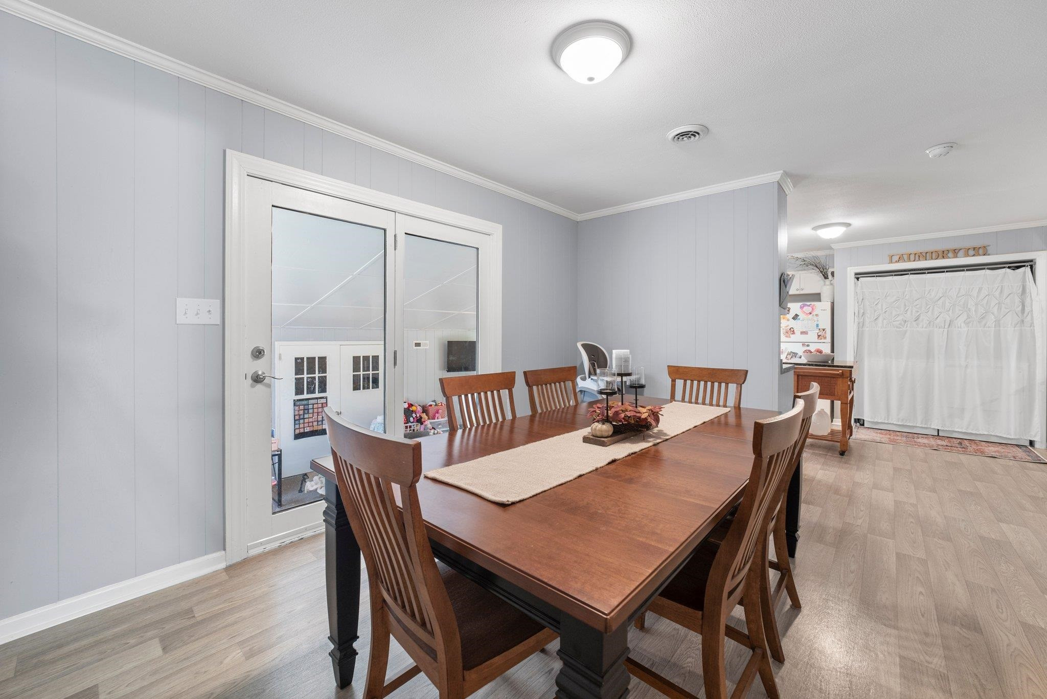 1818 Wellington Road Burlington, NC 27217 - Photo 13 of 36 a view of a dining room with furniture