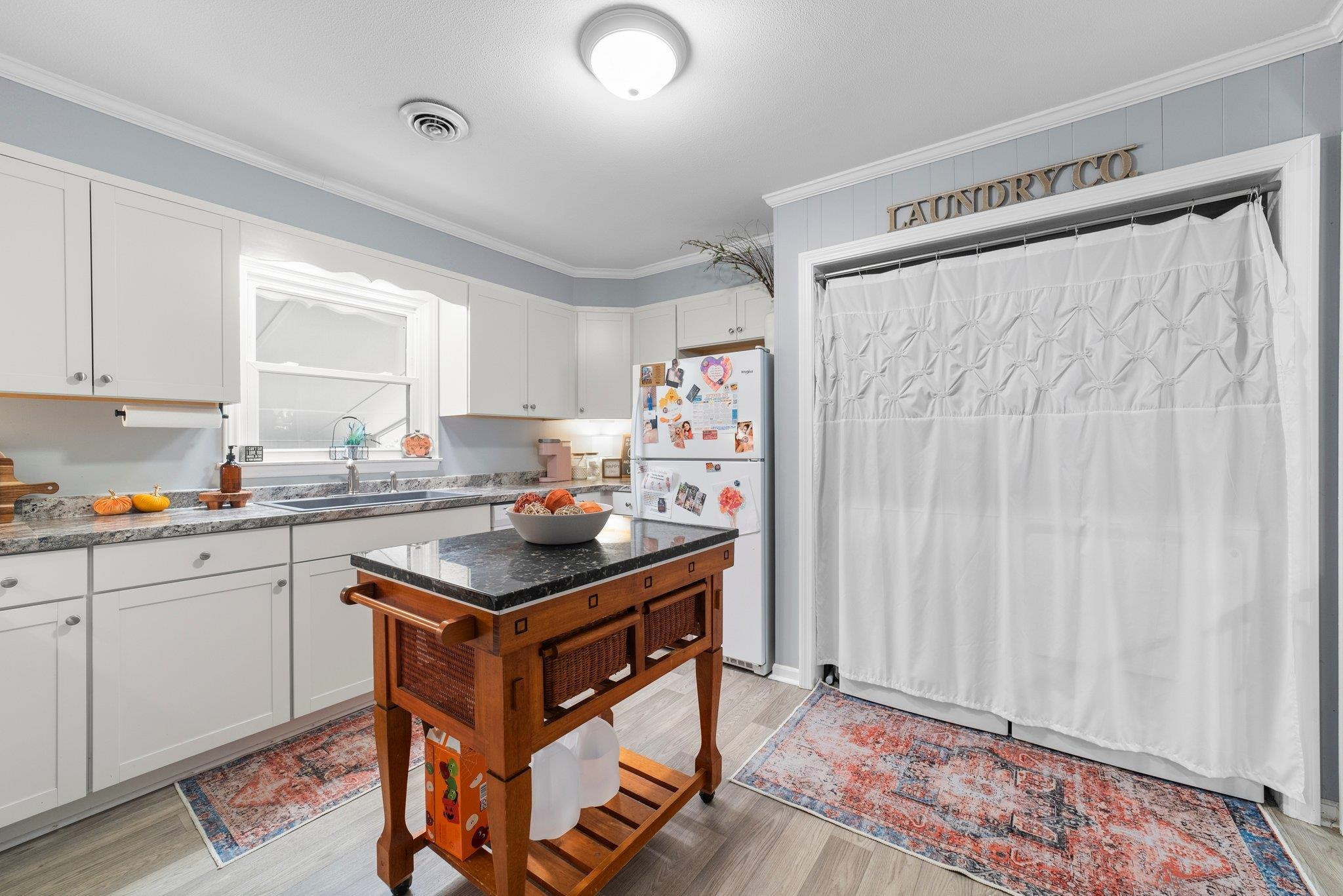 1818 Wellington Road Burlington, NC 27217 - Photo 15 of 36 a kitchen with stainless steel appliances granite countertop a stove and a sink