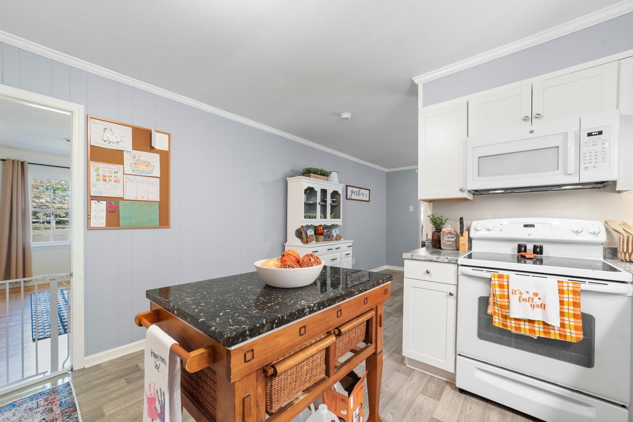 1818 Wellington Road Burlington, NC 27217 - Photo 18 of 36 a kitchen with stainless steel appliances granite countertop a stove a sink and a refrigerator