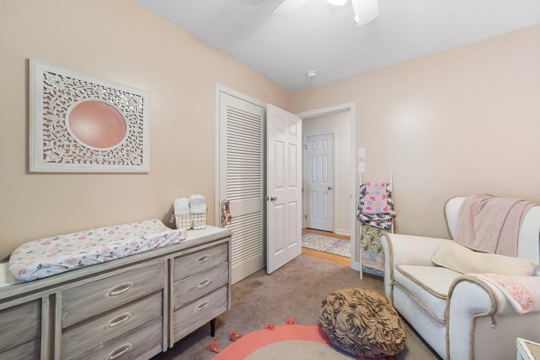 1818 Wellington Road Burlington, NC 27217 - Photo 21 of 36 a living room with furniture and painting on the wall