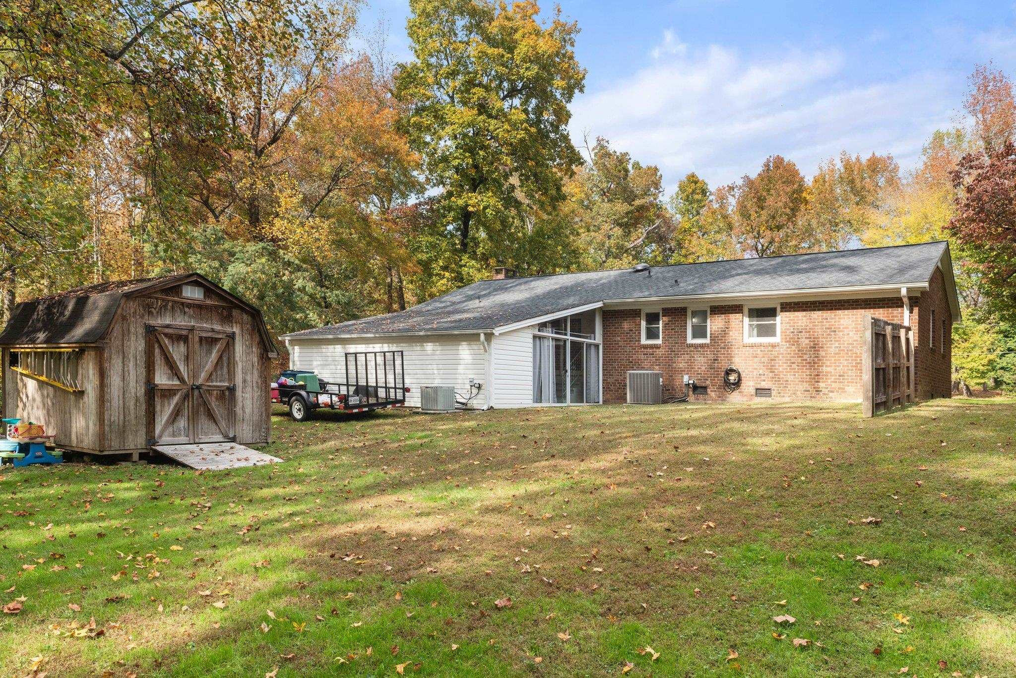 1818 Wellington Road Burlington, NC 27217 - Photo 35 of 36 a front view of a house with garden